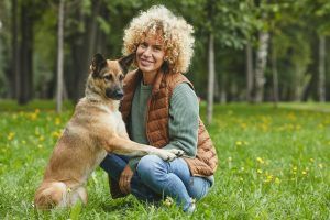 woman-with-dog-outdoors